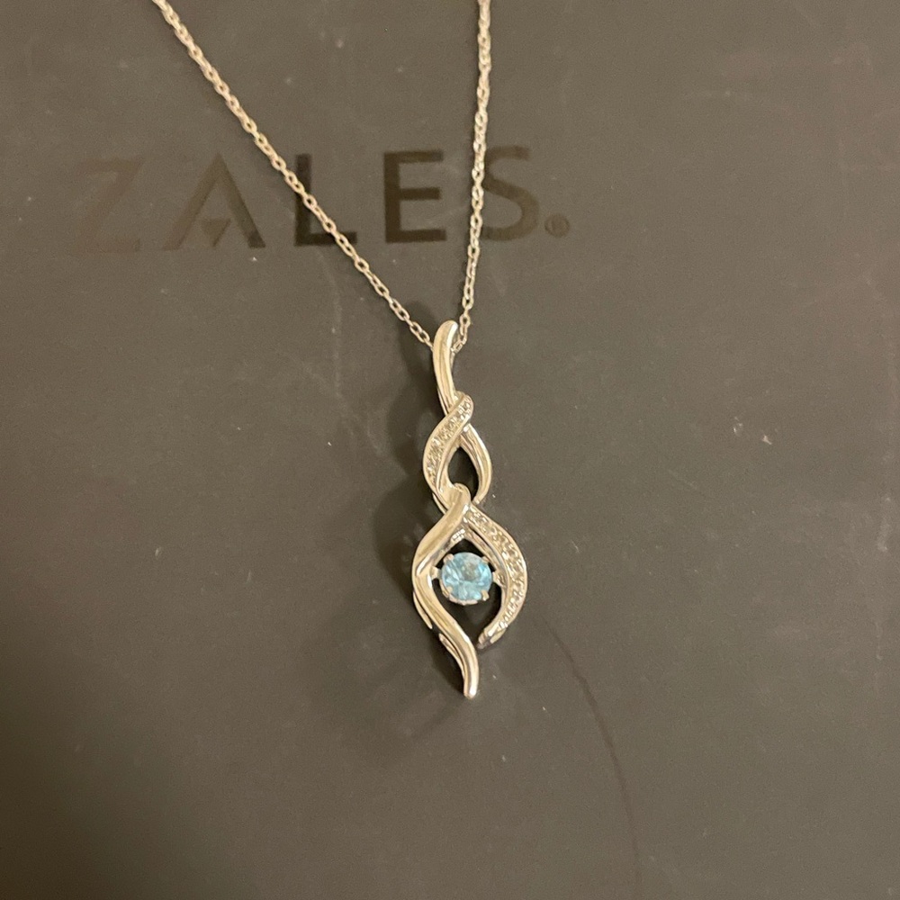 Swiss Blue Topaz and White Sapphire Infinity Pendant in Sterling Silver